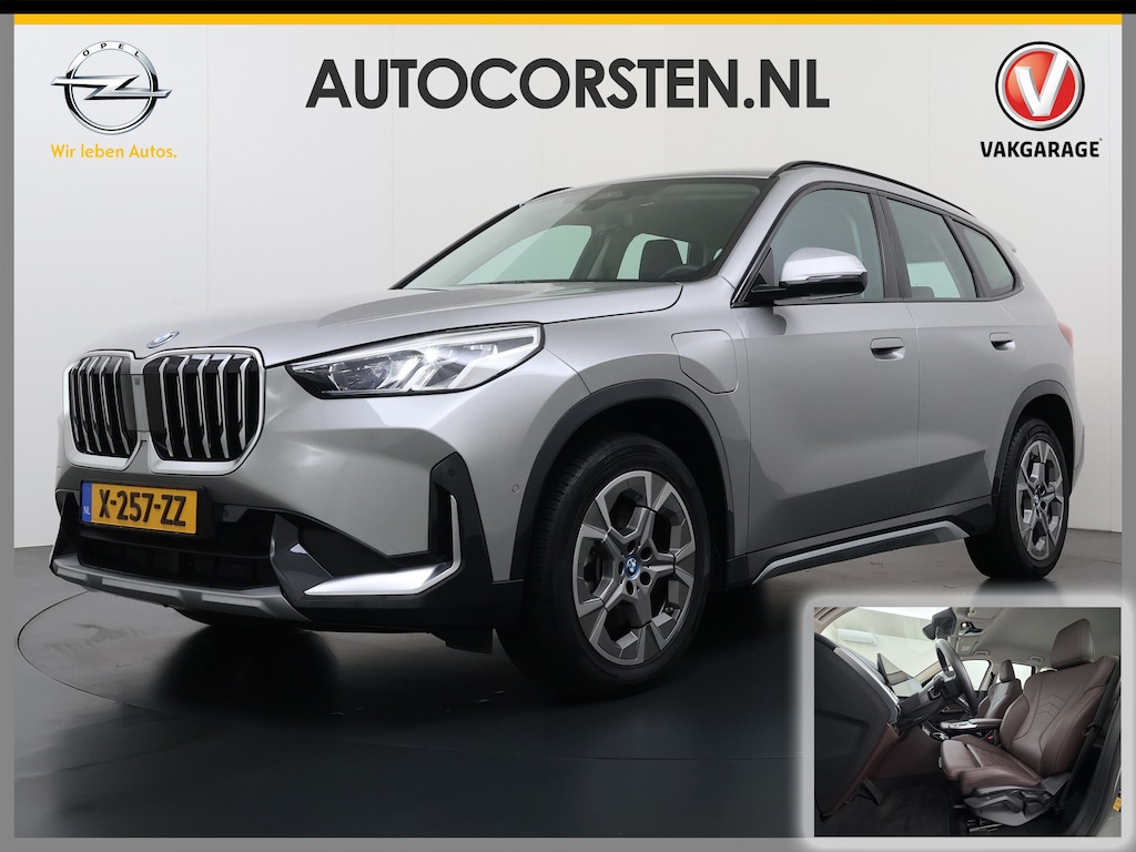 BMW X1 xDrive25e PHEV 245pk AUT-7 Leer Trekhaak Adap.Cruise Camera Navi Dual-Ecc ParkAssist Pdc Apple Carplay Android SOH 97% Hybride Lmv Elek.Achterklep Connect Drive Isofix DAB Led Regen-Lichtsensor Lane Assist Wifi AWD 1.700KG Trekgewicht 1e Eigenaar Dealeronderhouden Origineel Nederlandse Auto