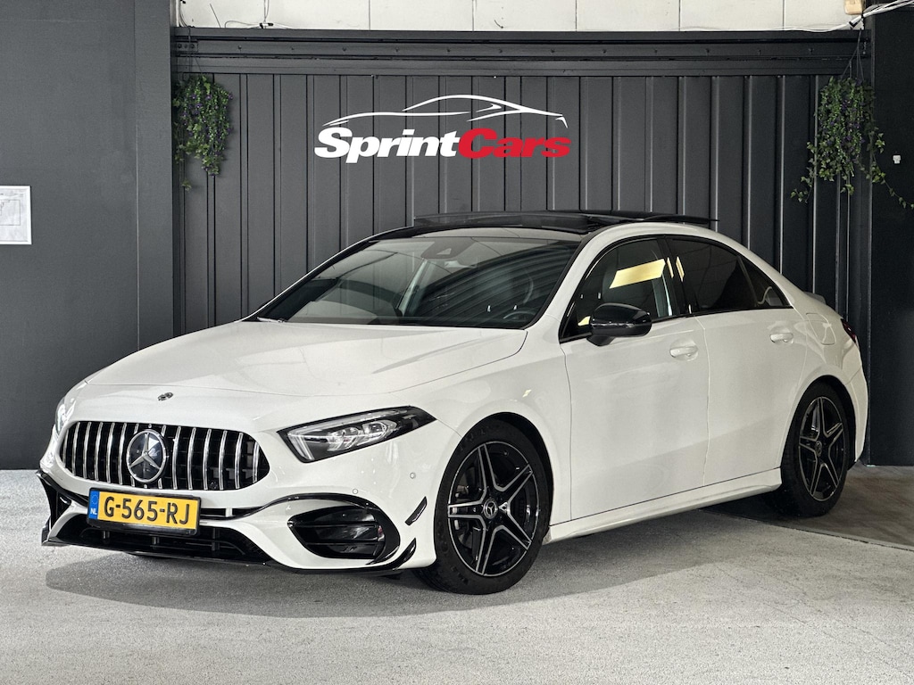 Mercedes-Benz A-klasse 180 Business Solution AMG | AMG-styling | Panoramadak | Achteruitrijcamera | Carplay | Cruise Control | Stoelverwarming | LED koplampen |