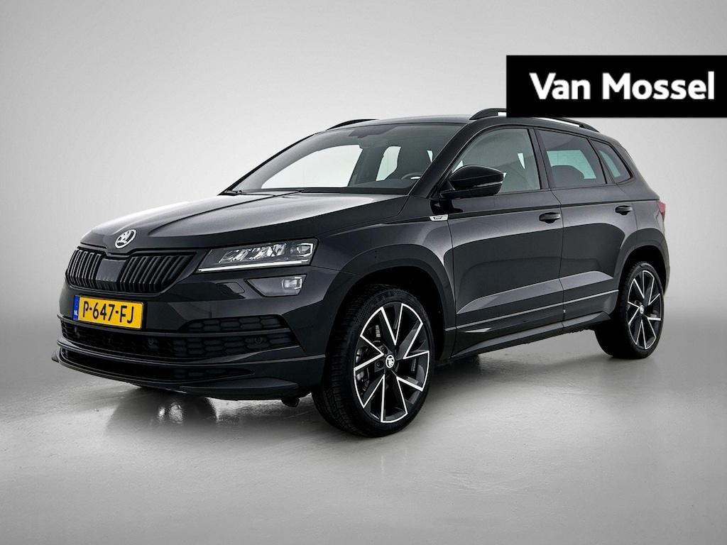 Skoda Karoq 1.5 TSI ACT Sportline Business | CAMERA | ZWENKBARE TREKHAAK | CANTON AUDIO | STOELVERWARMING | CRUISE CONTROL | APPLE CARPLAY & ANDROID AIUTO |