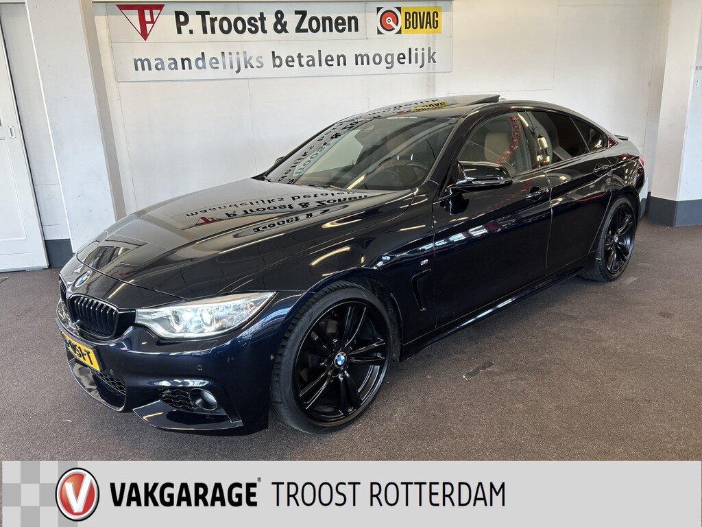 BMW 4-Serie Gran Coupe 420i Centennial High Executive M Sport | Panoramadak | Lederen bekleding | Head up display | Cruise control | Climate control | Lane assist | Nederlands geleverd | Achteruitrijcamera | Adaptief onderstel | Stoelverwarming | Elek. kofferklep | Elek. inklap
