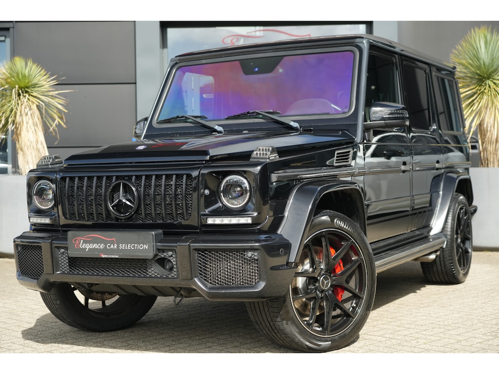 Mercedes-Benz G-klasse AMG 63 | 544PK | Schuifdak | Trekhaak | Camera | Leder | 20" | Mercedes-Benz G-Klasse AMG 63 544 PK met 5.5 V8 benzinemotor, elektrisch schuifdak, trekhaak, achteruitrijcamera, adaptieve cruise control, premium audiosysteem, navigatie, 20-inch AMG-velgen