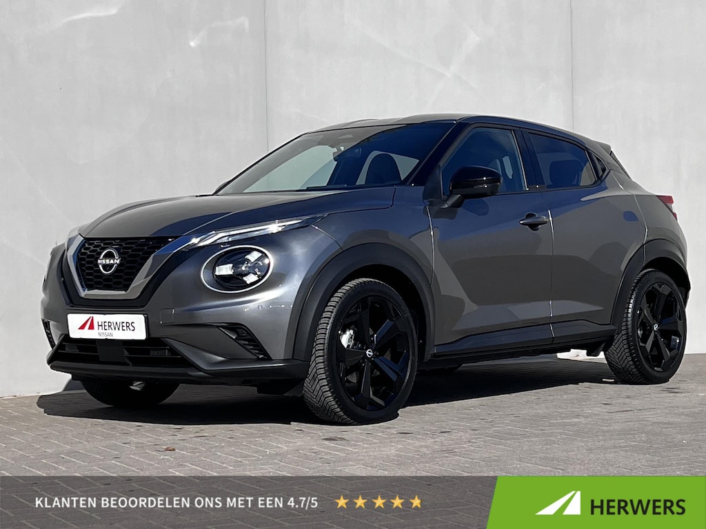Nissan Juke 1.0 DIG-T Tekna Automaat / Fabrieksgarantie tot 03-2028 <100.000 km / Automaat / Leder / Camera 360° / Cold Pack / Stuur-, stoel- & voorruitverwarming / Navigatie / Apple Carplay Android / 19" LM + All Season banden /