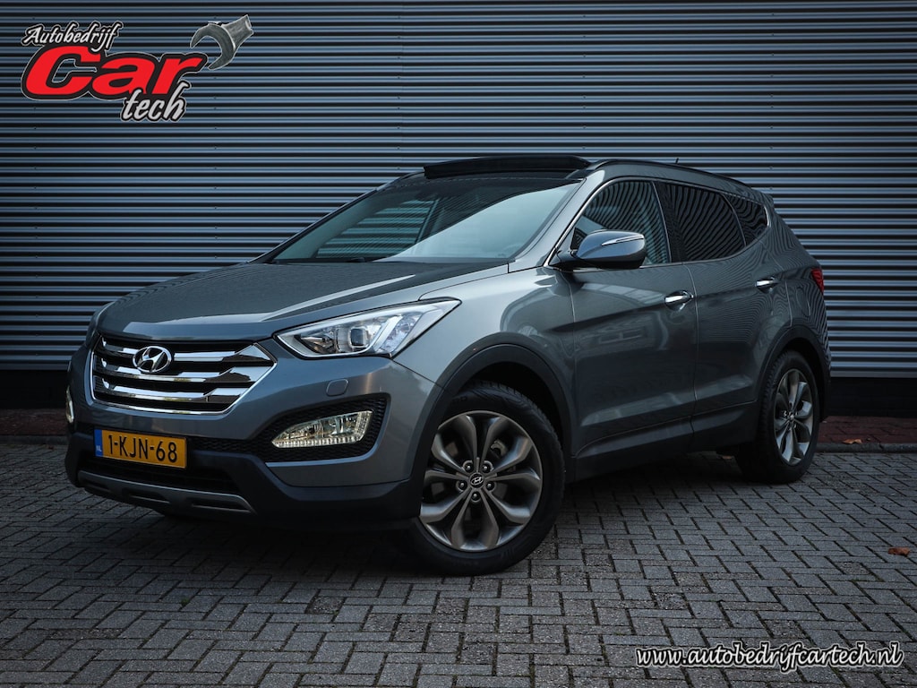 Hyundai Santa Fe 2.4i GDI 4WD i-Catcher 7p. | Clima | Cruise | Navi | Leer | Panoramadak | Camera | Stoelverwarming |