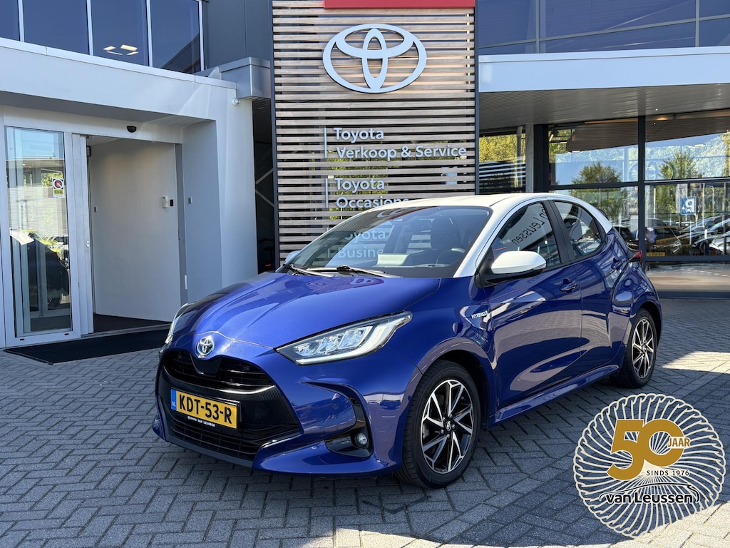 Toyota Yaris 1.5 Hybrid 115 BI-TONE KEYLESS HUD LM-VELGEN PARK-SENSOREN CAMERA BLUETOOTH DRAADLOOS-LADEN APPLE/ANDROID AD-CRUISE DAB+