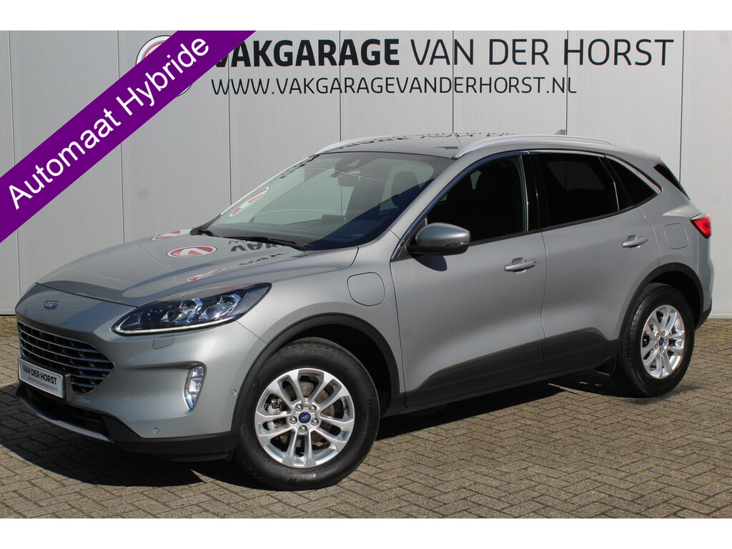 Ford Kuga 2.5-225pk PHEV Titanium X. Luxe hybride rijden voor een reëel bedrag ! Adapt. Cruise Cntrl, Climate Cntrl, Naviagtie, Telefoonvoorb., Keyless entry/keyless go, Stoel- en voorraamverw., Camera v+a, Metallic lak, Elektr. achterklep etc.