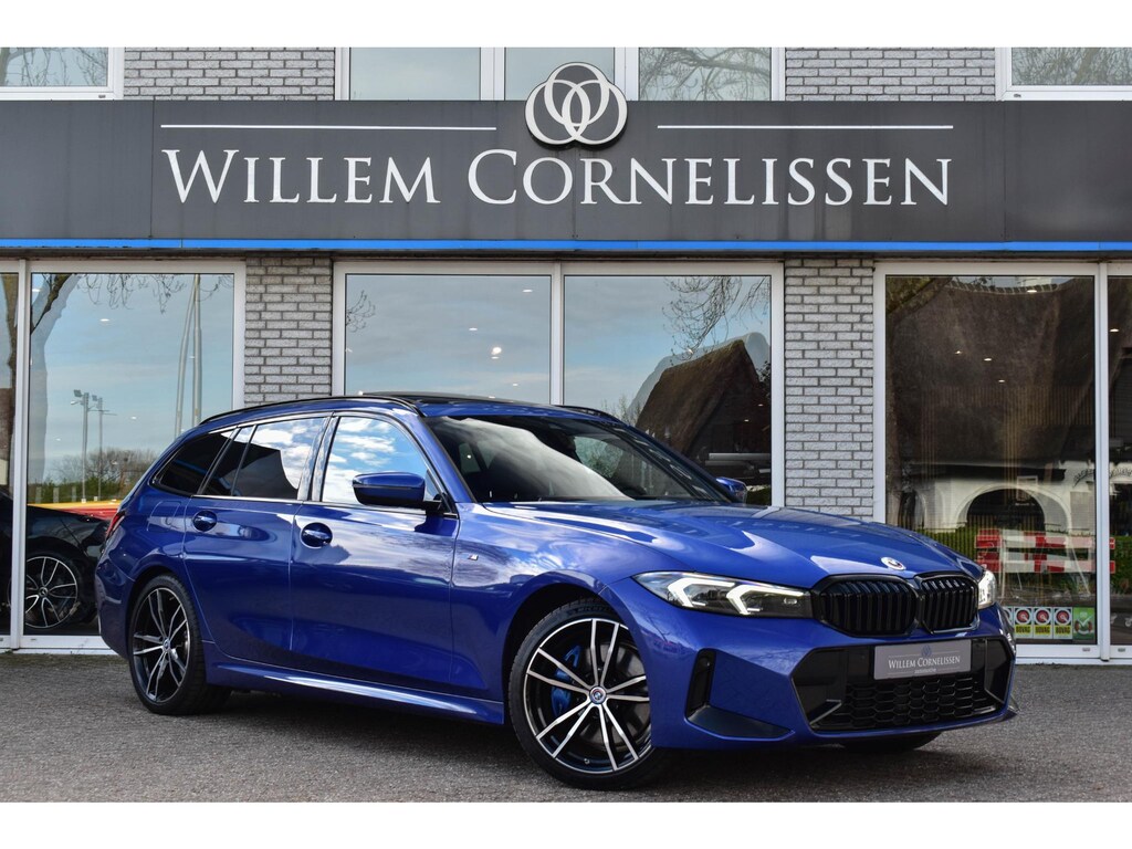 BMW 3-Serie Touring 320e M-Sport Pro Pano Trekhaak Leder Elc Stoelen