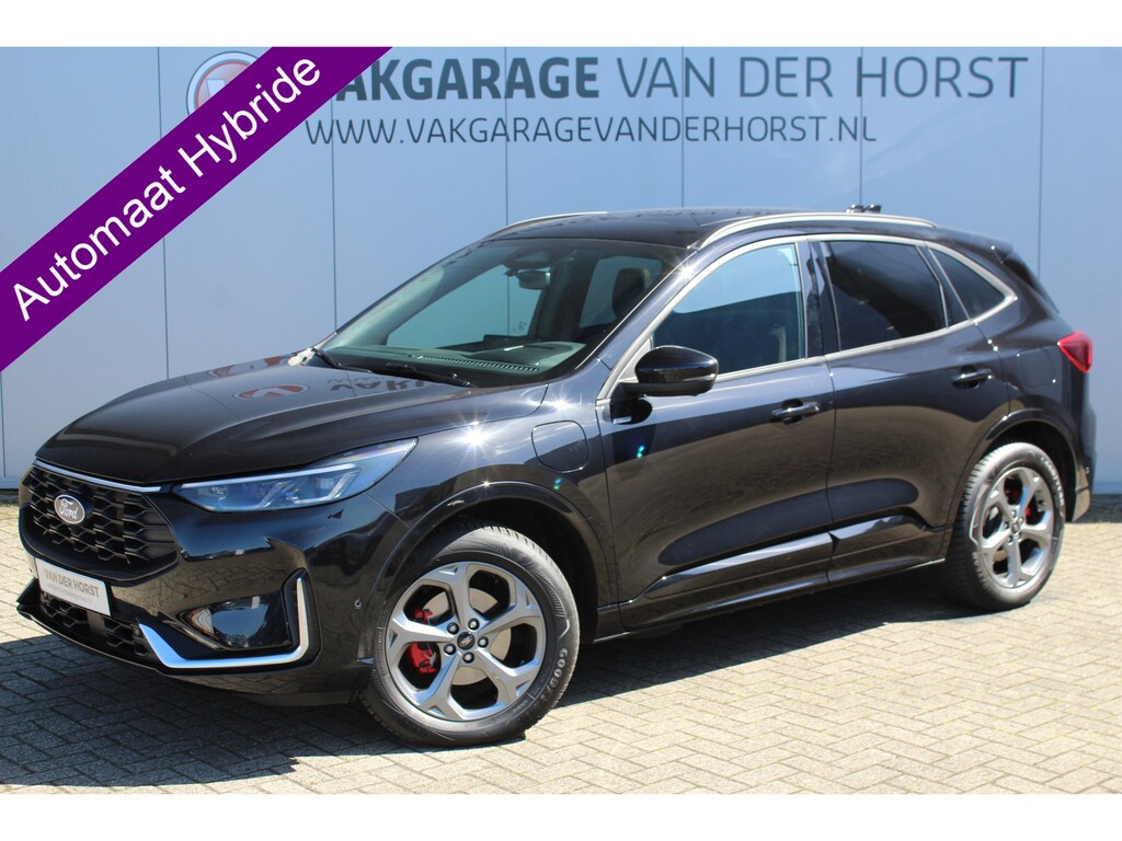 Ford Kuga 2.5-243pk PHEV ST-Line X. Trekgewicht 2.100kg ! Nieuw model ! Van €. 54.937,- voor €. 41880,- ! Trekgewicht van 2.100kg ! Elektr. panodak, Elektr. inklapb. trekhaak, stoel-, stuur- en voorraamverw., camera v+a, HUD, Apple carplay/Android auto, Elektr. verstelb. comfortstoelen etc.