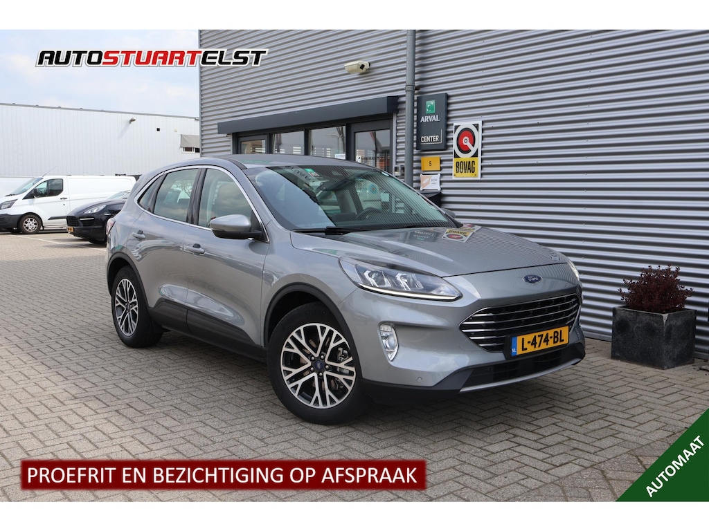 Ford Kuga 2.5 PHEV Titanium 1e Eigenaar | Volledig Onderh | BTW | NAP | SOH91% | Trekhaak | 2 Kabels | Carplay | Navi | Cruise | DAB | Keyless | Bots | PDC