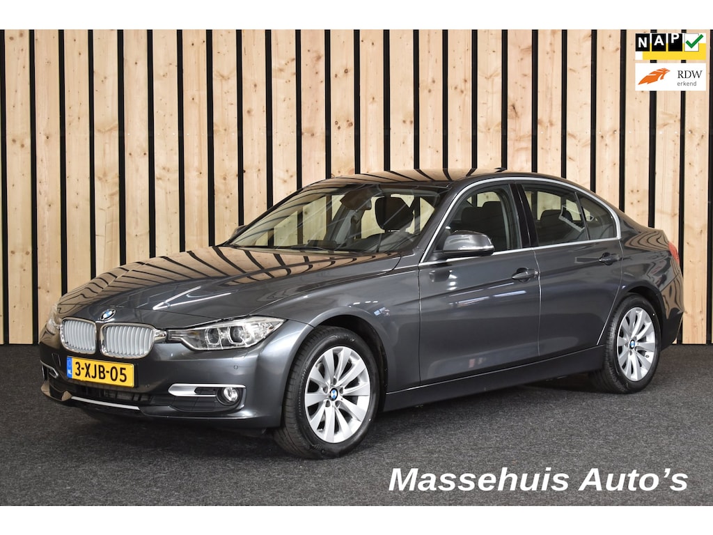 BMW 3-Serie 316i High Executive 139dkm Leer Trekhaak 2e eig. Automaat PDC V+A Nwe APK