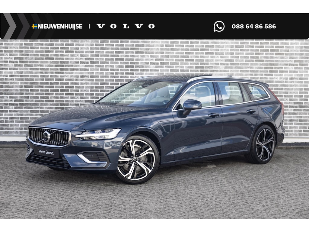 Volvo V60 2.0 T6 Plug-in Hybrid AWD Ultimate Bright | PHEV Long Range | Trekhaak | Head-up Display | Harman/Kardon Audio | Panorama dak | 360 Graden Camera | BLIS | Cruise Control Adaptief | Elektrische Achterklep | Keyless Entry | Apple Carplay | Android Auto