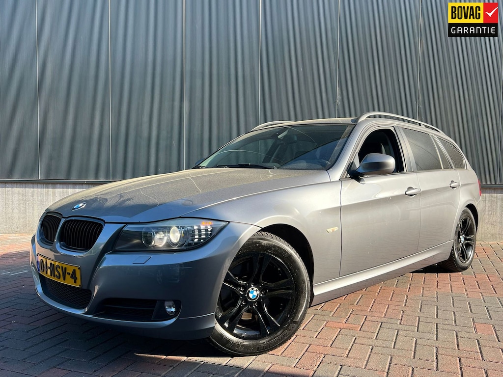 BMW 3-Serie Touring 318i Business Line * Navi * Cruise * Climate * Leer * Trekhaak *