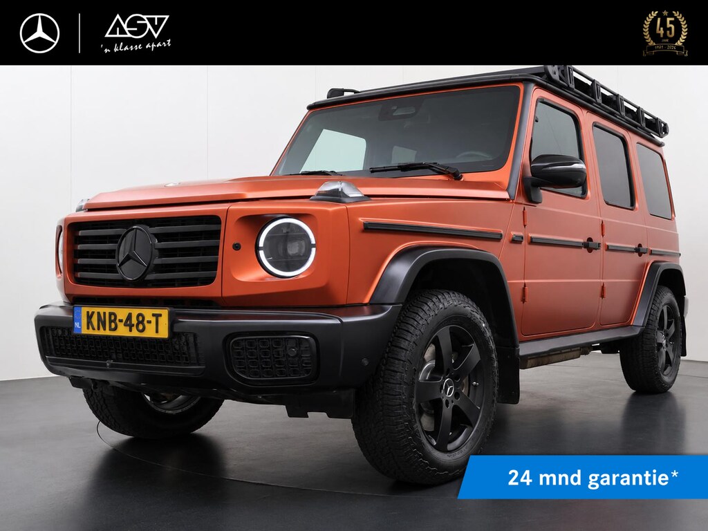 Mercedes-Benz G-klasse 500 | Facelift | Professional Roofrack | Trekhaak | Schuif - Kanteldak | Massage Stoelen Voor | MBUX Hugh-End Entertainment pakket Achter | Nappa Leder Bekleding | Distronic Cruise Control & Stuur Assistent | Burmester 3D Sound System | 360° Camera