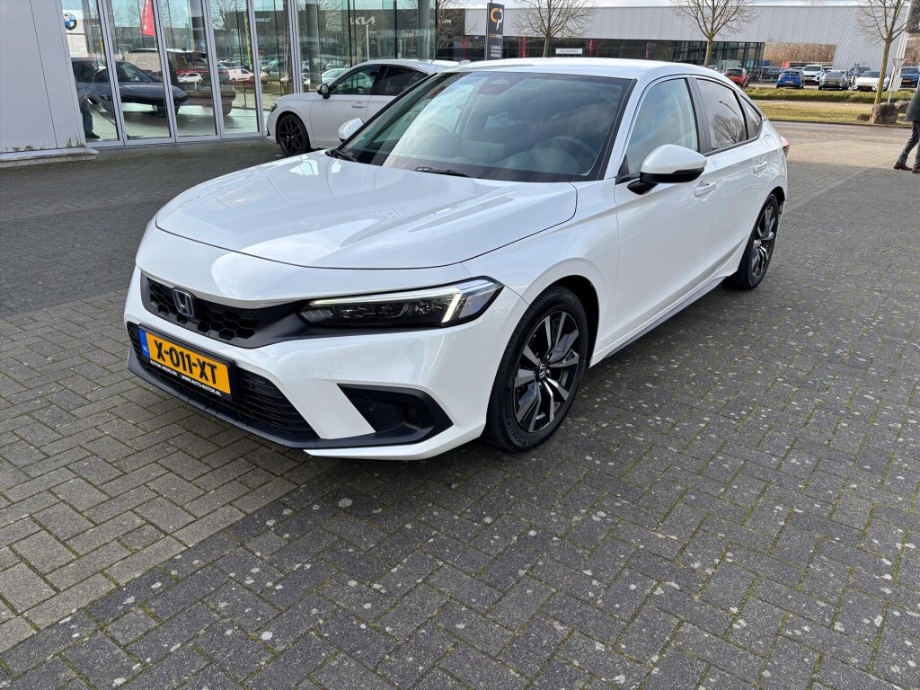 Honda Civic 2.0 e:HEV Hybrid Elegance | Pdc | P.cam | Navi | Dealer onderhouden