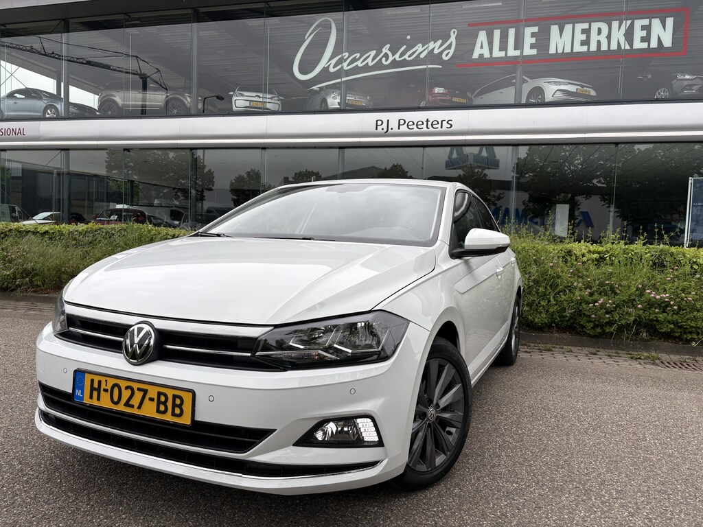 Volkswagen Polo 1.0 TSI Highline Airco - Apple carplay - Navigatie - Parkeersensoren - Parkeer assistent - Cruise control - Licht metalen velgen 16 inch - Lederen versnellingspook - Bluetooth - Led verlichting - Radio - Start/stop systeem - Stuur leder - Stuur multifunctioneel - Elektrische ramen