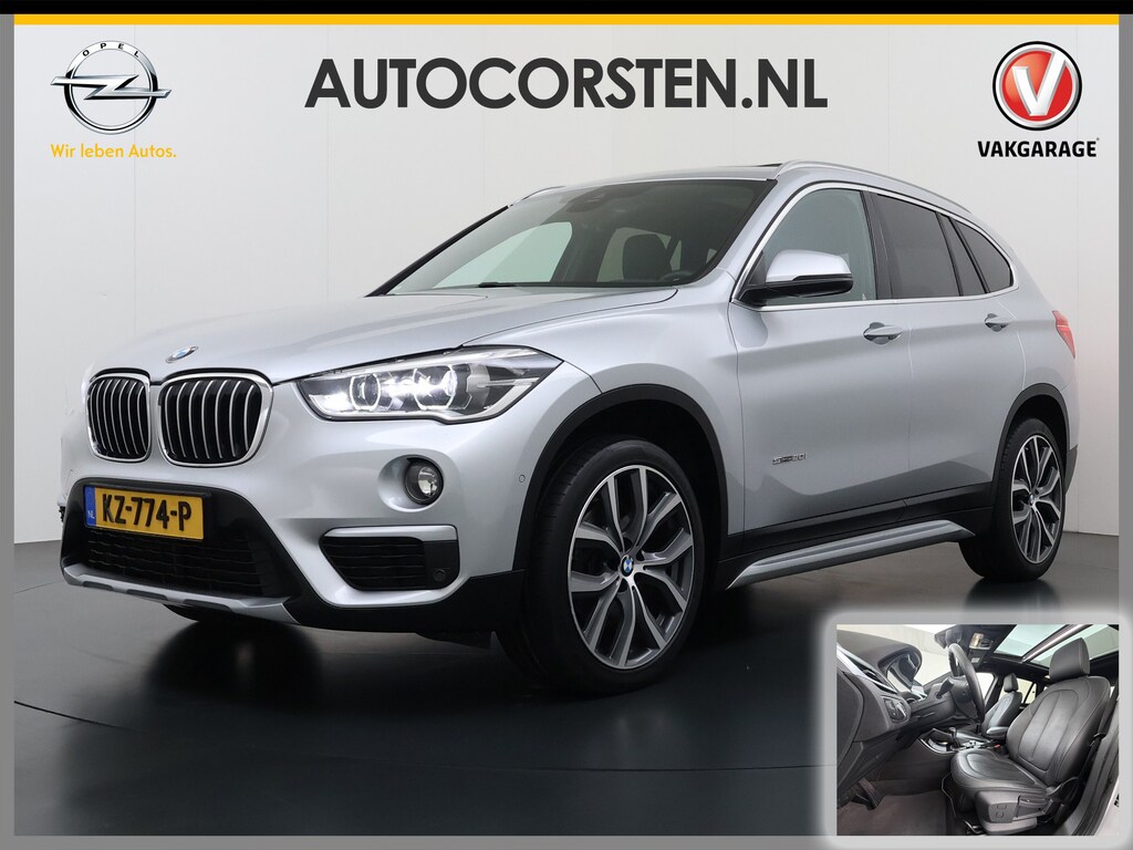 BMW X1 sDrive 2.0i 192PK Aut. PanoramaDak Harman Kardon®-Hifi Leder+Verwarmd Navi Plus Ecc Pdc Centennial High Executive Elek.Achterklep Led Lmv 19" Privacy Glas Cruise Control Bluetooth Origineel Nederlandse Auto