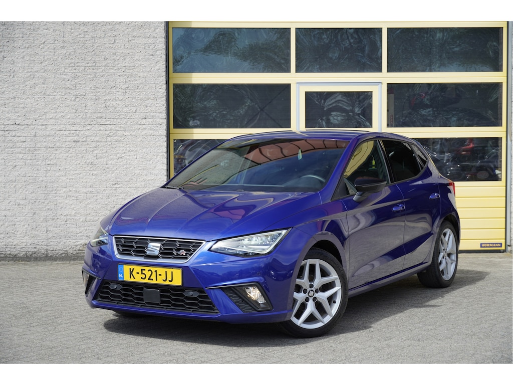SEAT Ibiza 1.0 TSI 5drs FR Business Intense Plus BJ2020 Lmv 17" | Led V+A | Pdc | Achteruitrijcamera | App-Connect | Navi | Virtual cockpit | Dashboard verlichting | Climate control | Cruise control | Sportstoelen | Sportstuur | Verwarmde voorstoelen | Zwarte hemel