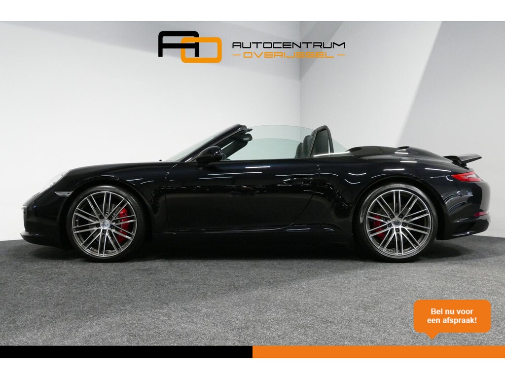 Porsche 911 Cabrio 3.0 Carrera S / Sportuitlaat / Elektr. verstelbare stoelen + memory (14wegs) / PDLS+ / Sport-Chrono Pakket / Stoelverwarming / Apple Carplay / BOSE audio systeem / 21'' LMV / Achteruitrijcamera / Cruise Control