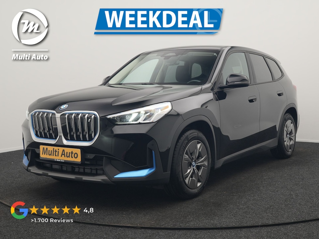 BMW iX1 xDrive30 67 kWh 313pk Dealer O.H. | Adaptief M Onderstel | Camera | Cruise Control | Stoelverwarming | Widescreen Navi | Park Assist | Apple Carplay | Navigatie | DAB | Standkachel |