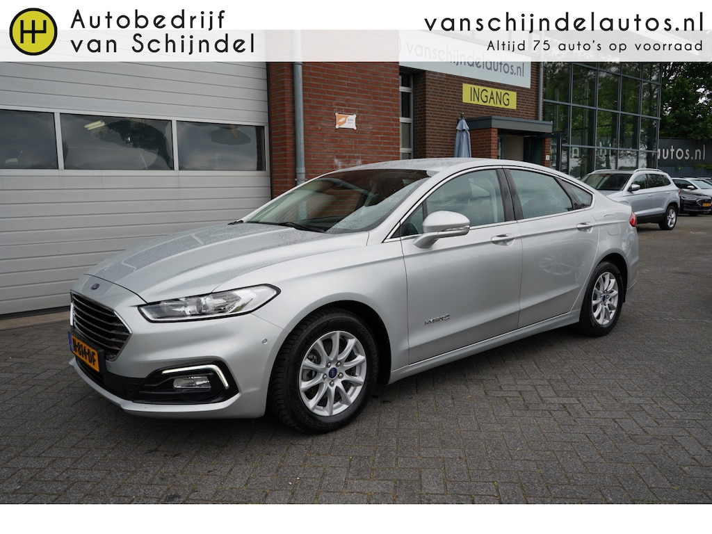 Ford Mondeo 2.0 IVCT HEV Titanium NL AUTO - NAP - AUTOMAAT NAVI - PARKEERSENSOREN V+A - CLIMA - CRUISE - DAB+ - RIJSTROOKSENSOR - LM VELGEN - AUT. VERLICHTING - 4 ELEKTR RAMEN / SPIEGELS