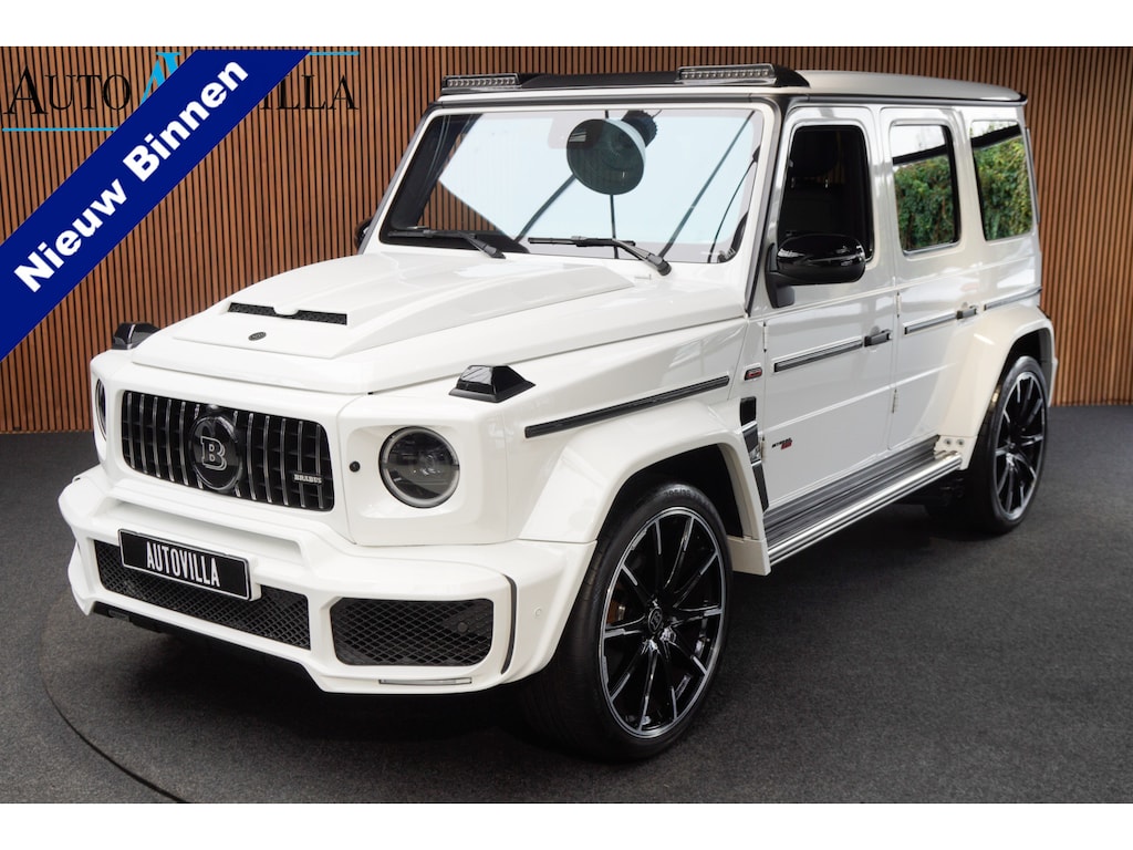 Mercedes-Benz G-klasse BRABUS 800 Massage Burmester PTS 360° Camera Leer Navi Stoelventilatie Stoelverwarming voor en achter Climate voor & achter Memory seats Distronic Plus Elektr. bedienb. schuif-/ kanteldak PTS LM velgen