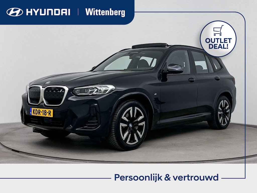 BMW iX3 High EXECUTIVE 80 kWh *| SUMMERDEAL! | SoH 97% | CLIMA | CRUISE ADAPT. | NAVI | 20'' LM VELGEN | OPEN DAK | LEDER | STOELVERWARMING | APPLE CAR PLAY & ANDROID AUTO |