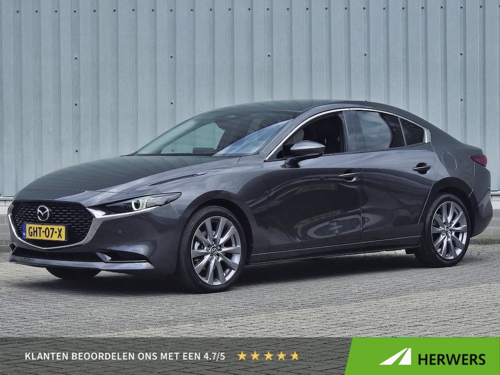 Mazda 3 2.0 SkyActiv Hybrid 150PK Exclusive-Line / Trekhaak / Stoel & Stuurverwarming / Lederen Bekleding / Head-Up Display / Elektrisch Bedienbare Bestuurdersstoel met Geheugen / Apple Carplay & Android Auto / Climate Control / Navigatie /