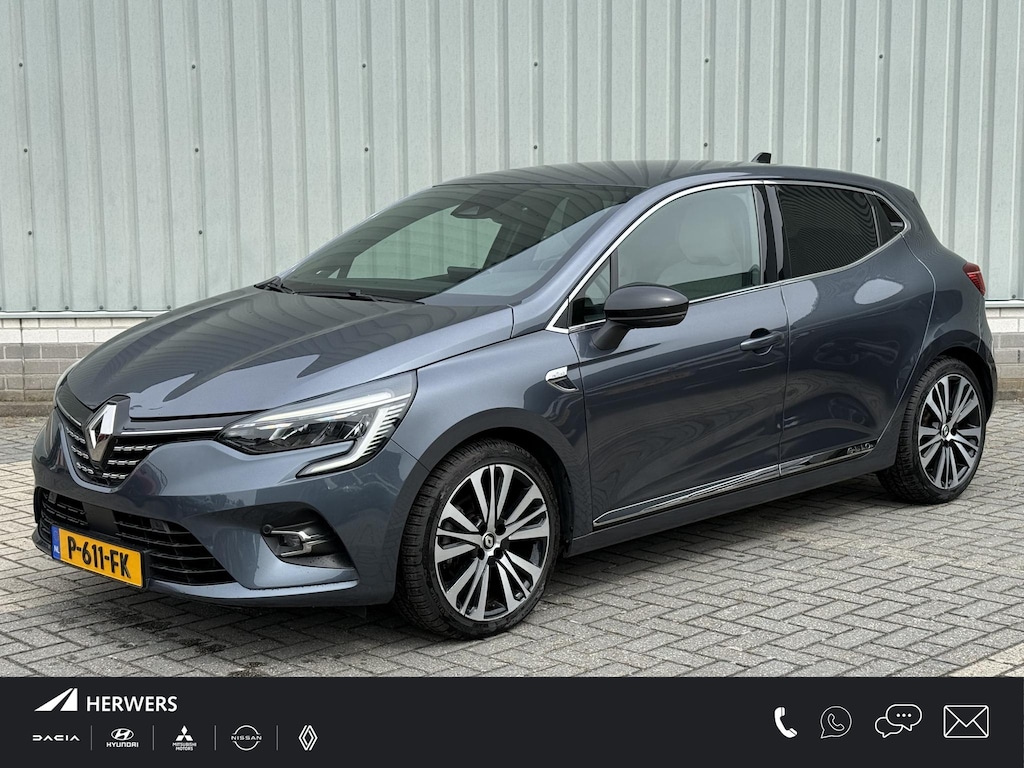 Renault Clio E-Tech Hybrid 140PK Initiale Paris / BOSE Premium Audio / Lederen Bekleding / Stoel & Stuurverwarming / Apple Carplay & Android Auto / All Season Banden / Trekhaak / Navigatie / Achteruitrijcamera /