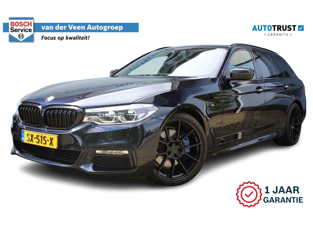 BMW 5-Serie Touring 530i High Executive M-sport | Incl. 12 maanden garantie | Panoramadak | Dodehoek detectie | Geheugenstoelen | Parkeercamera | Standkachel | Head-up display | Elektrisch uitklapbare trekhaak | Stoelverwarming | Draadloze telefoonlader | Luxe lederen bekleding |