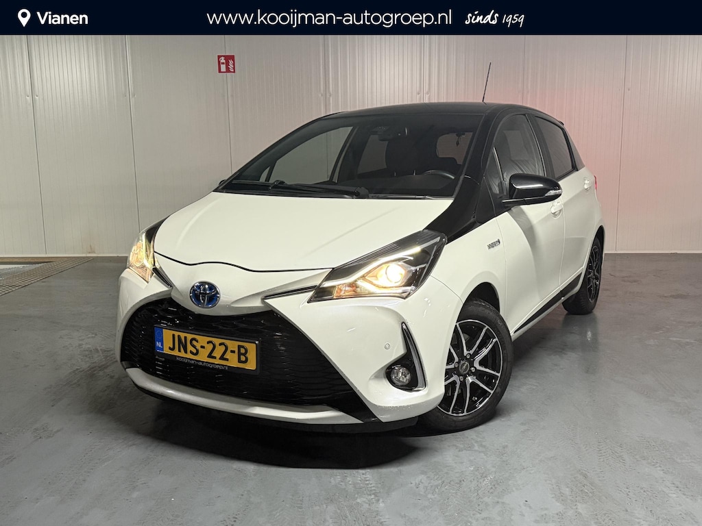 Toyota Yaris 1.5 Hybrid Bi-Tone Luxe en nette auto slechts 72366 KM met stoelverwarming, parkeersensoren etc