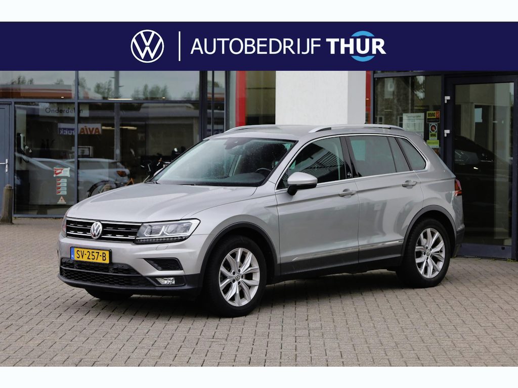 Volkswagen Tiguan 1.4 TSI ACT Comfortline Business R 150PK / 110kW DSG, Door ons onderhouden, LED koplampen, Apple Carplay & Android Auto, navigatie, wegklapbare trekhaak, 18" LMV, adaptieve cruise control (acc), verwarmbare voorstoelen, privacy glas, elektrisch verstel- en verwarmbare buitenspiegels, parkeersensoren voor en achter (pdc), DAB+, climatronic etc.