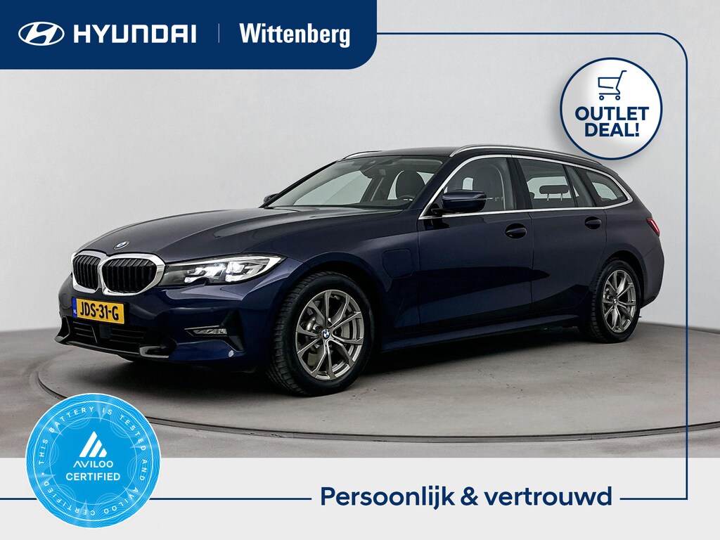 BMW 3-Serie Touring 330e High Executive Plug-in | ACTIE! | Sportstoelen | Stoelverwarming | Trekhaak | Trekgewicht 1500kg | Navigatie | El. bed. achterklep |