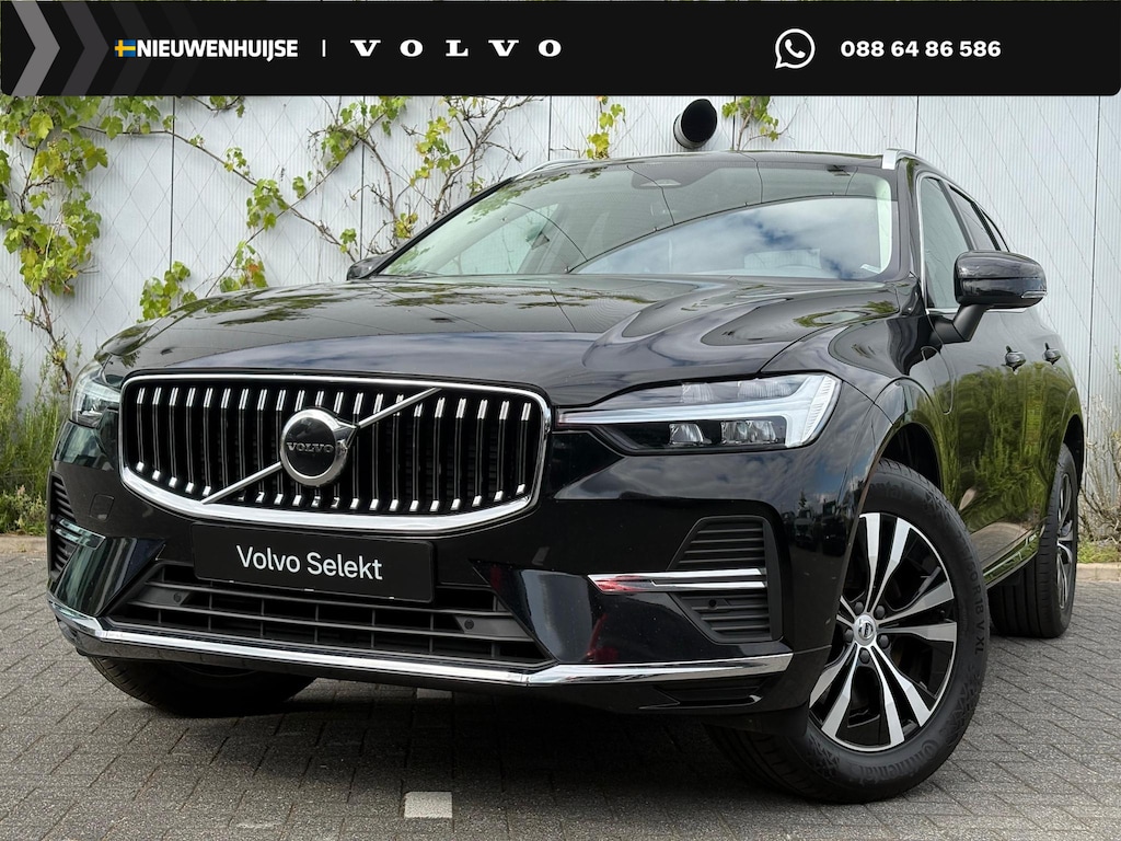 Volvo XC60 2.0 T6 Plug-in hybrid AWD Essential Bright | Adaptieve Cruise Control | Panoramadak | Stoel-/Stuur-/Voorruitverwarming | Standverwarming | Dodehoek Detectie | Parkeercamera | Lederen Bekleding |