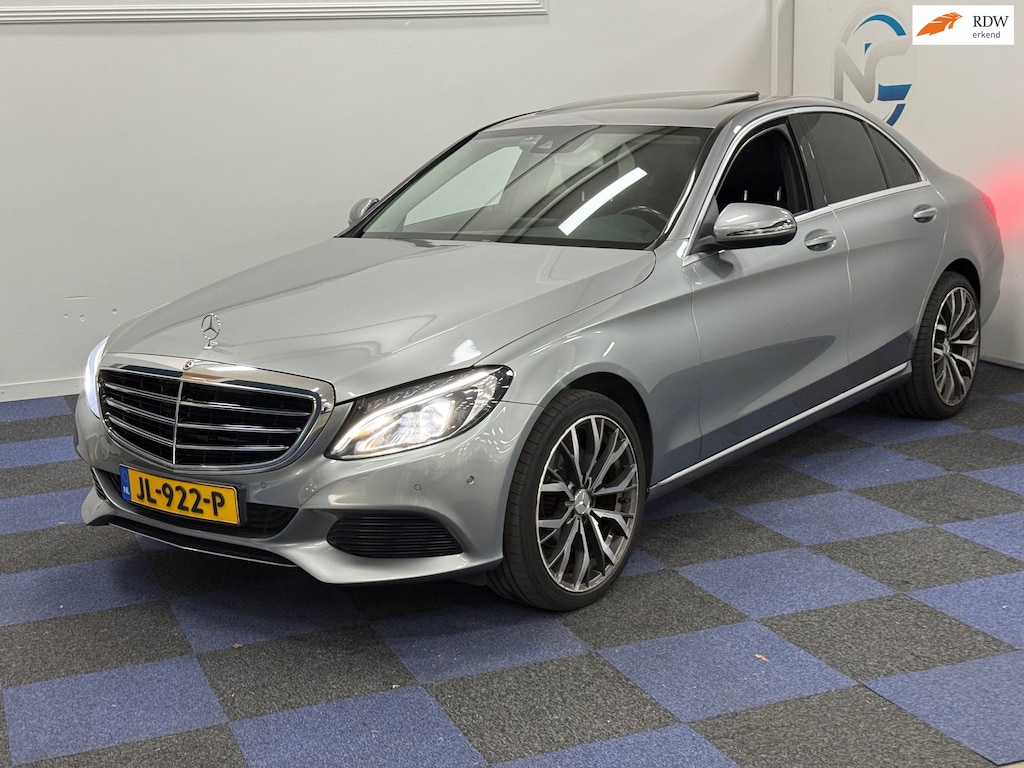Mercedes-Benz C-klasse 180 Prestige / AUTOMAAT / SCHUIFKANTELDAK / DEALER ONDERHOUDEN