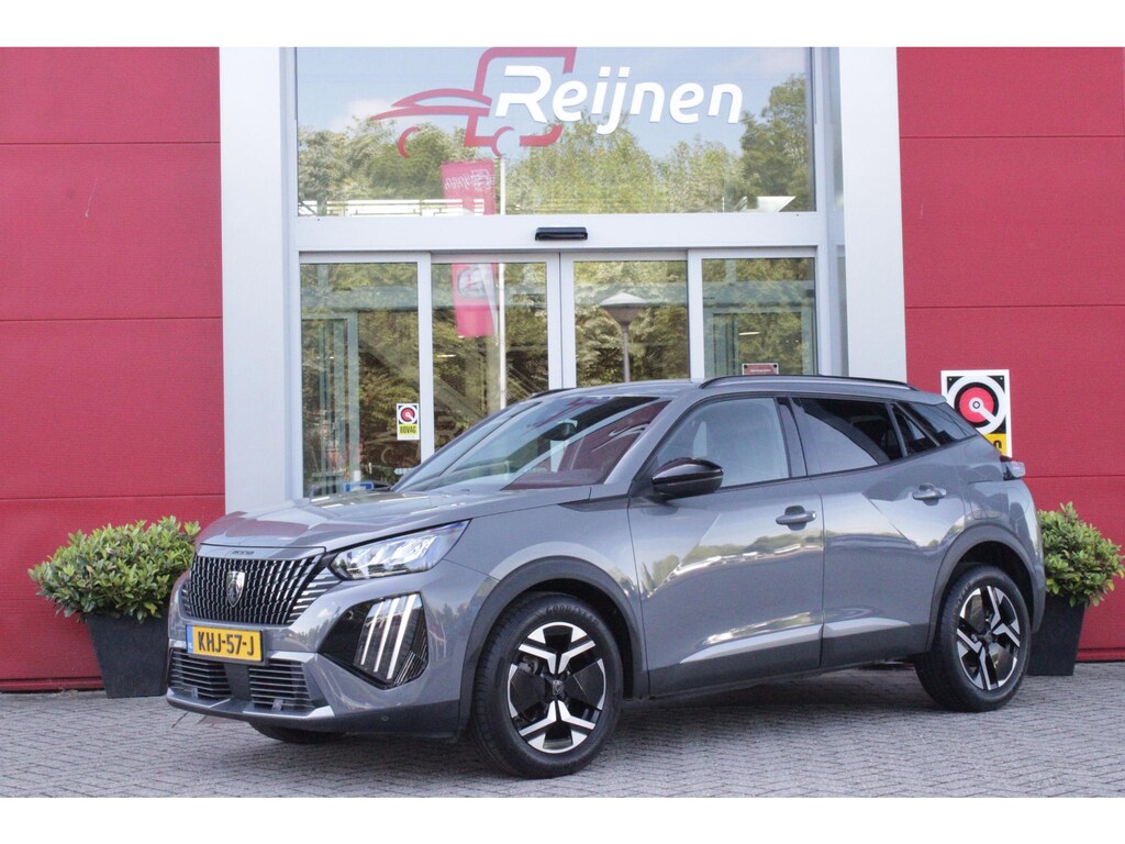 Peugeot 2008 1.2 100PK ALLURE | DRAADLOZE APPLE CARPLAY/ANDROID AUTO | PARKEERSENSOREN VOOR + ACHTER | CRUISE CONTROL | DAB+ RADIO | CLIMATE CONTROL | 17" LICHTMETALEN VELGEN |