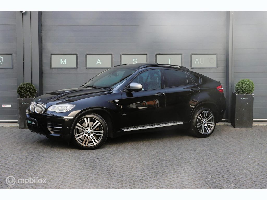 BMW X6 M50d|Schuifdak|HUD|Soft close|LED|Memory|4-zone climate