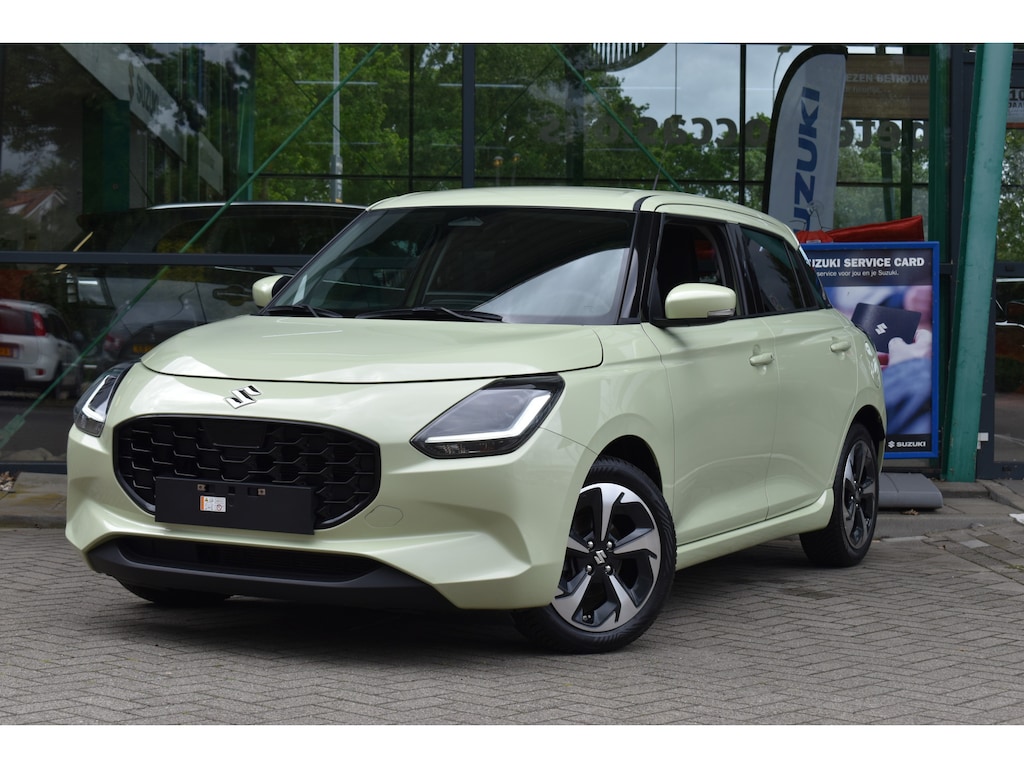 Suzuki Swift 1.2 Style Smart Hybrid | Apple Carplay/Android Auto | Achteruitrijcamera | Climate control | Cruise Control |