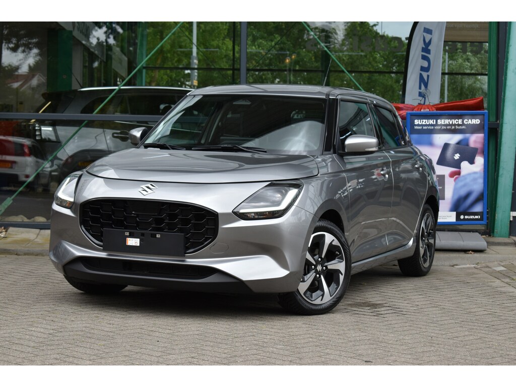 Suzuki Swift 1.2 Style Smart Hybrid | Apple Carplay/Android Auto | Achteruitrijcamera | Climate control | Cruise Control |
