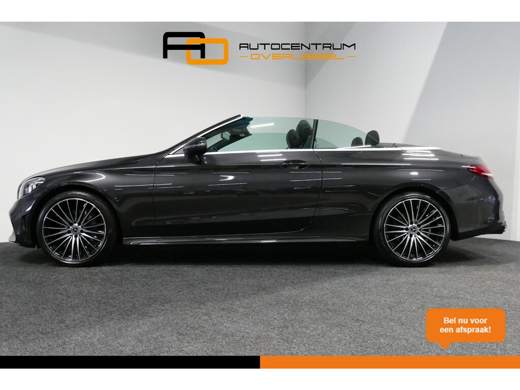 Mercedes-Benz C-klasse Cabrio 180 AMG Line / C63S AMG Diffuser / Nekverwarming - Airscarf / Panamericana Grille / Stoelverwarming / Apple Carplay - Android Auto / Full LED / Ambienteverlichting / Achteruitrijcamera / Cruise Control / Dodehoekdetectie / 20'' LMV