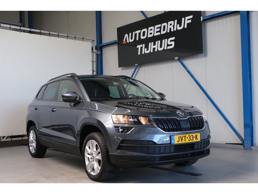 Skoda Karoq 1.0 TSI Style - Airco, Cruise, Navi, PDC, Carplay, Trekhaak.