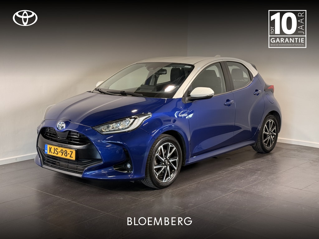 Toyota Yaris 1.5 Hybrid 115 Style Bi-Tone Limited | Head-up display | Dodehoekdetectie | Parkeersensoren voor en achter | Apple Carplay |