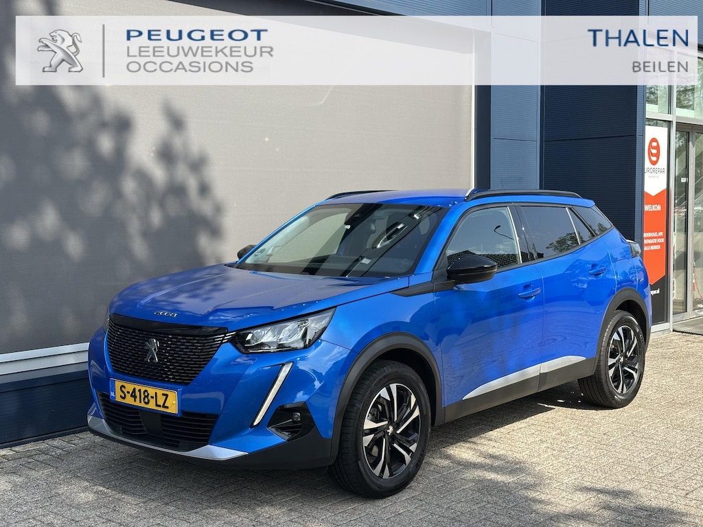 Peugeot 2008 1.2 Turbo 130 PK Allure Pack | Trekhaak 1200 KG | Navigatie | 3D Virtual Cockpit | Stoelverwarming | LED Verlichting | Half Lederen Bekleding | Keyless Start | Climate Control | Cruise Control | 17 Inch Lichtmetalen Velgen |