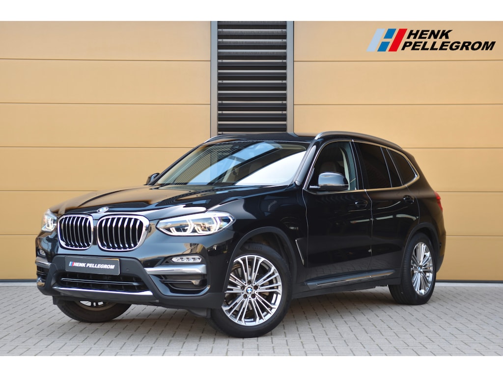 BMW X3 xDrive20i High Executive * Sportstoelen * Stuurverwarming * Trekhaak * Privacy glass *