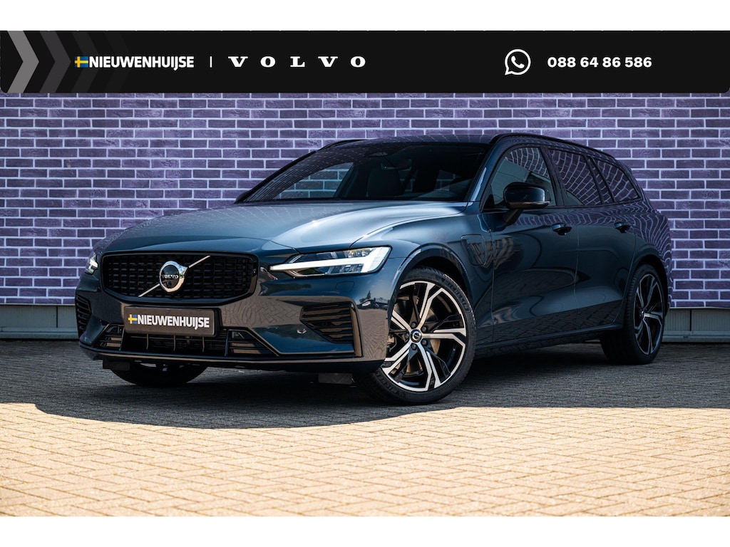 Volvo V60 T6 Plug-in hybrid AWD Ultra Dark | Google | Long Range | Schuif-/Kanteldak | Adaptieve Cruise Control | DAB | Head-Up Display | Camera | Stoelverwarming Voor + Achter | Harman Kardon Audio | Getint Glas | Zitverlenging | Elek. Stoelen | Memory | 19" LM
