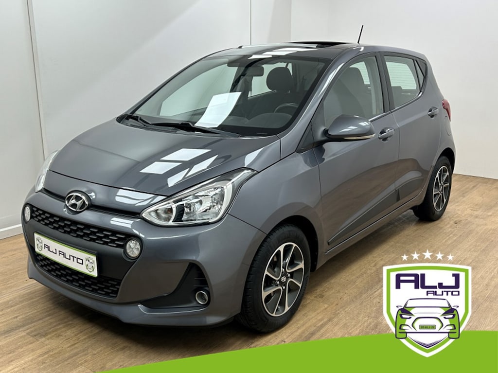 Hyundai i10 Occasion 1.2i | Grijs | Tweedehands Hyundai i10 | Airco | Panoramadak | Automaat | Bluetooth | Stoelverwarming