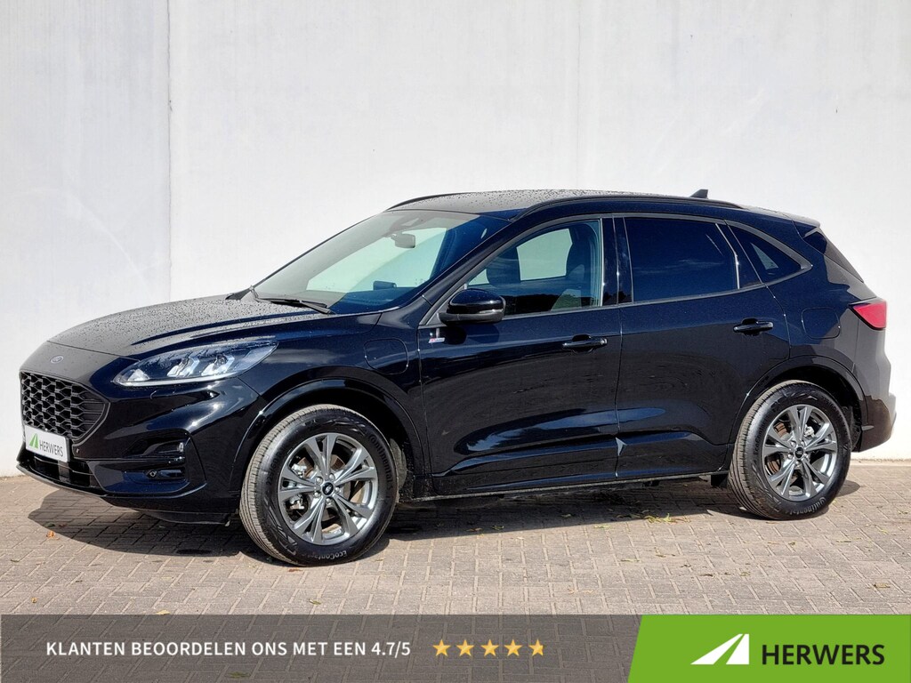 Ford Kuga 2.5 PHEV ST-Line / Navigatie / Apple Carplay Android / Stoel & Stuurverwarming & Achterbank Verwarming / Achteruitrijcamera / Voorruit Verwarming / Navigatie / Climate Control / 18"LM wielen /