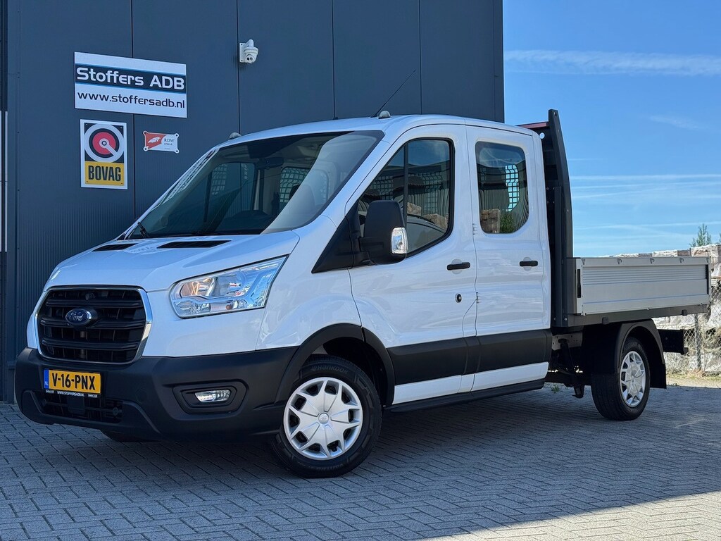 Ford Transit 310 2.0 TDCI 130pk L2H1 DC Trend | Open Laadbak | Trekhaak 2550KG | Airco | Kunstleder | Bluetooth | 7-persoons