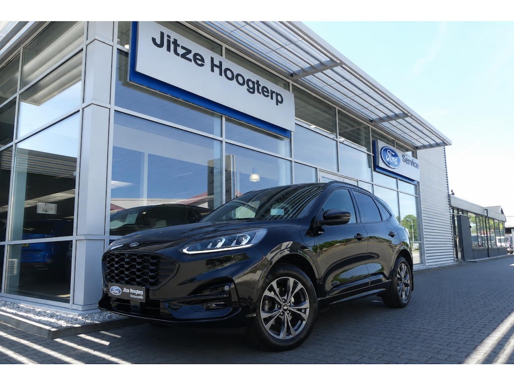 Ford Kuga 2.5 PHEV ST-Line X AFN. TREKHAAK (1.500KG), HUD, WINTER PACK, ADAPT. CRUISE, CLIMA, NAVI, CAMERA V&A, PDC V&A, APPLE CARPLAY/ANDROID AUTO, BLIS, KEYLESS, B&O, ELEKT. ACHTERKLEP, ELEKT. STOEL, 62.953KM