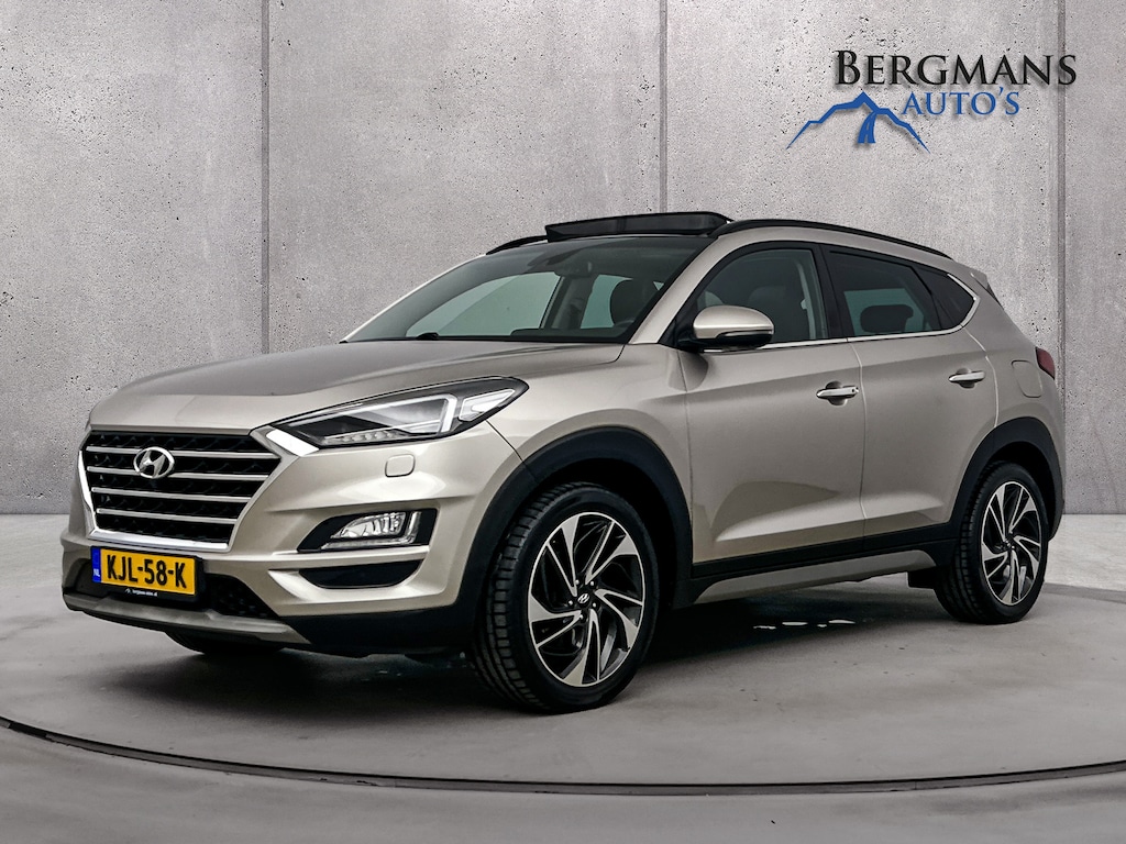 Hyundai Tucson // 1.6 T-GDI 4WD Premium // DEALERONDERHOUDEN // SCHUIFKANTELDAK // STOELKOELING //