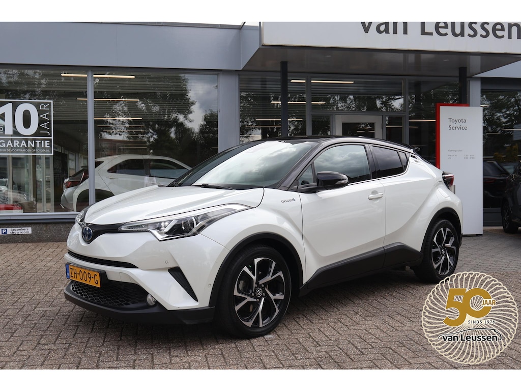 Toyota C-HR / C-HR+ 1.8 HYBRID STYLE BI-TONE DODEHOEK JBL-GELUID STOELVERW. KEYLESS PARK.SENSOREN