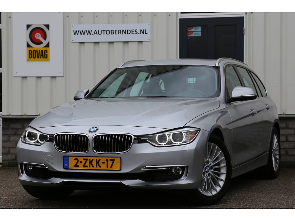 BMW 3-Serie Touring 320i High Executive*NL-Auto*Perfect Onderh.*Leder/Stoelverw./Gr. Navi/Keyless Entry+Go/LED/Climate-Control/Cruise-Control/17 inch LM*
